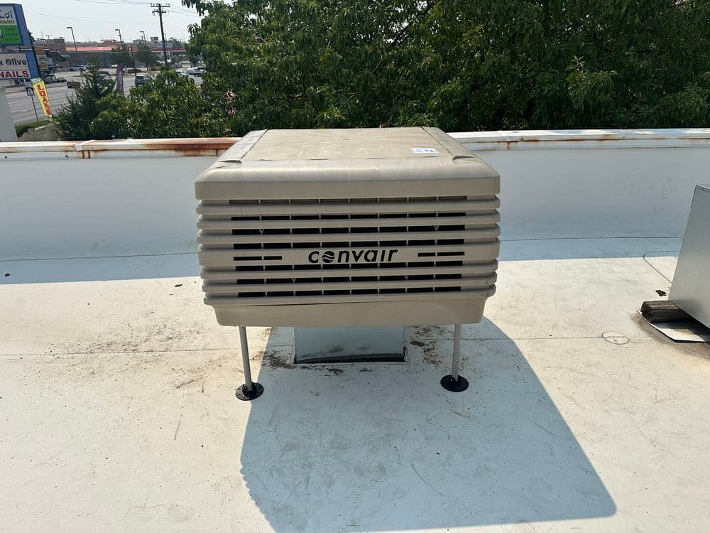 Convair rooftop air conditioning unit on a commercial building.