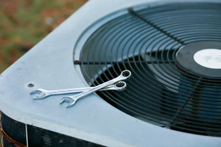 AC-Repairs An outdoor AC Unit ready to be replaced using tools
